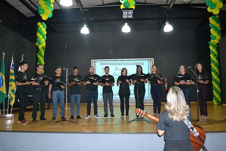 Coral durante apresentação em evento acadêmico de 2016